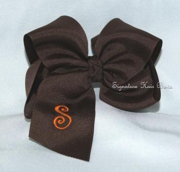 brown monogrammed hair bow