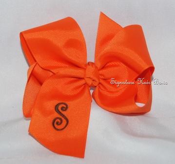 orange monogrammed hair bow