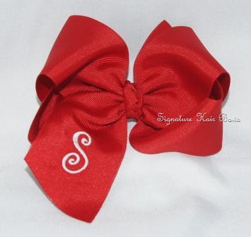 red monogrammed hair bow