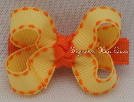 Sunshine Stitches Baby Grippy Bow